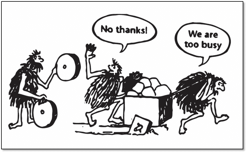 Cartoon depicting cavemen struggling to pull square-wheeled cart, saying "No thanks! We are too busy" to another caveman offering round wheels.
